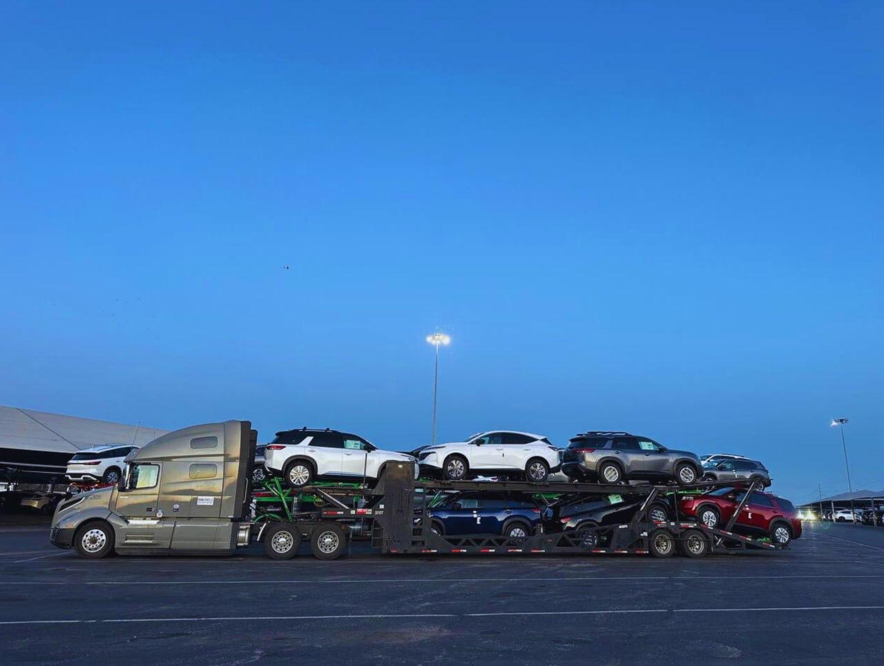 Carrier loaded with performance vehicles